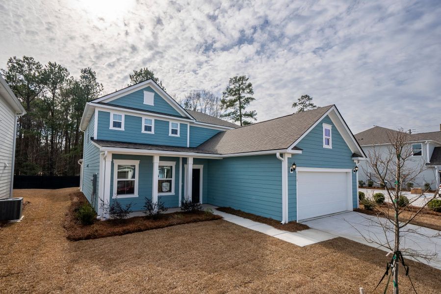 Front exterior of a new home in Monroe Preserve, Chapin, SC, highlighting curb appeal (Image 28).