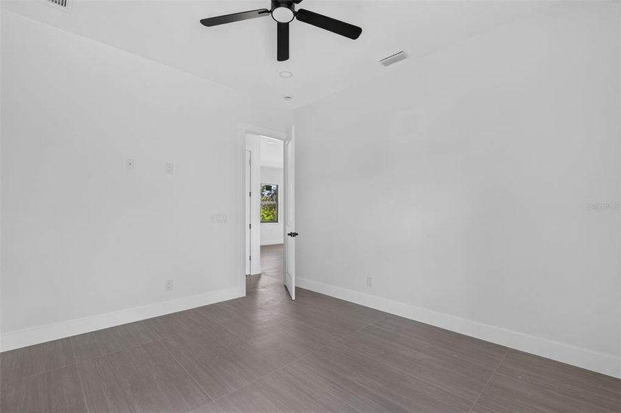 Spacious, unfurnished interior of a new home in , Port Charlotte (Image 17).