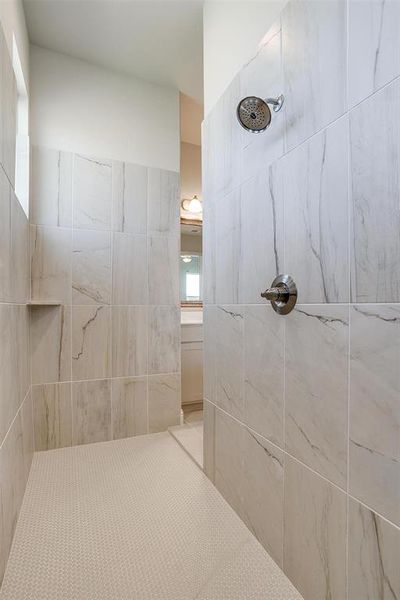 Bathroom with tiled shower