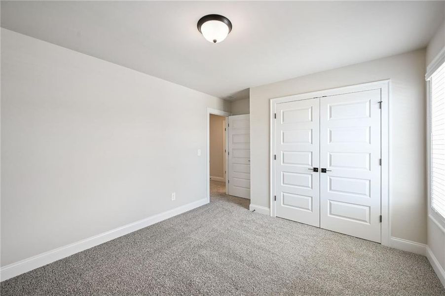 Spacious, unfurnished interior of a new home in Vines at Mill Creek - Legacy Series, Braselton (Image 27).