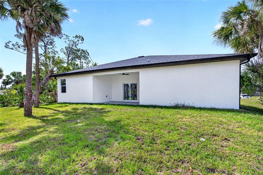 Exterior details and patio area of a home in , North Port (Image 22).