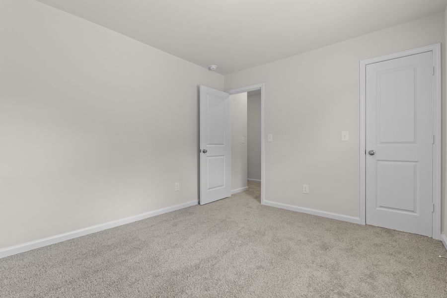 Representative unfurnished interior of a home built from the Cedar A by McGuinn Homes in Forts Ridge, Pelion (Image 23).