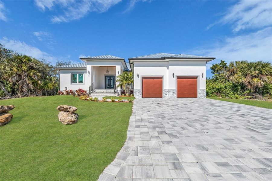 Front exterior of a new home in , Port Charlotte, FL, highlighting curb appeal (Image 29).
