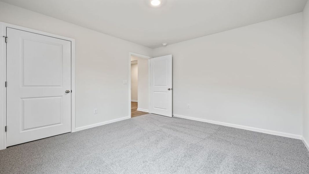 Spacious, unfurnished interior of a new home in Lakestone, Woodruff (Image 19).