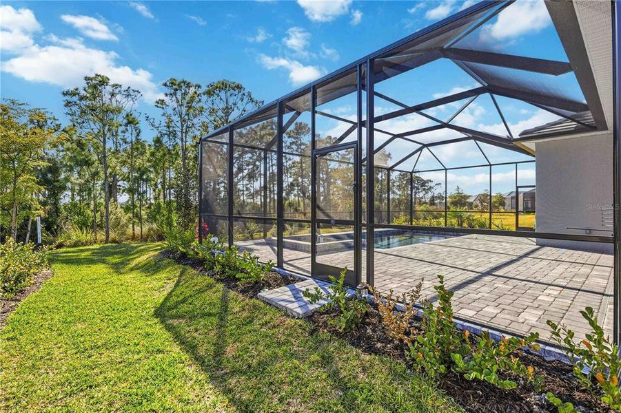 Exterior details and patio area of a home in Wellen Park Golf & Country Club, Venice (Image 19).