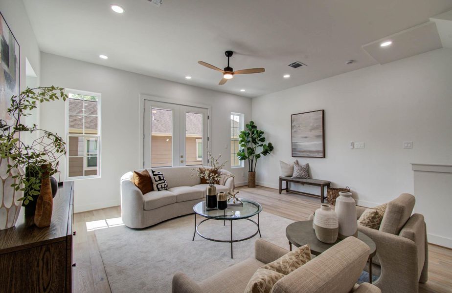 No details were over-looked in this home! Conveniences throughout with homeowners in mind. Remote controlled smart-fans throughout the home, modern and sleek, and floor outlets for convenience. 10' ceilings on the second floor and third floors.