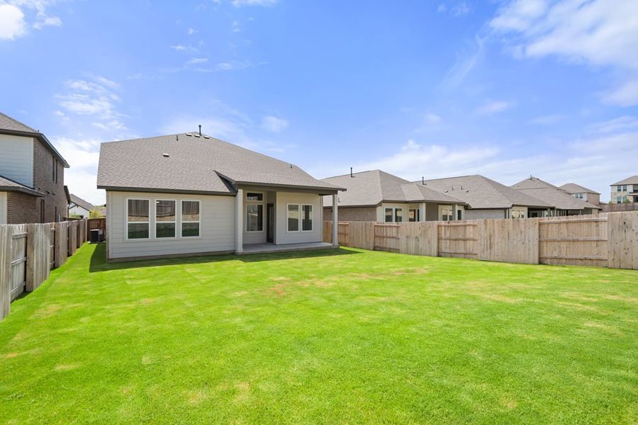 Front exterior of a new home in Park Collection at Lariat, Liberty Hill, TX, highlighting curb appeal (Image 23). Front exterior of a new home in Park Collection at Lariat, Liberty Hill, TX, highlighting curb appeal (Image 23).
