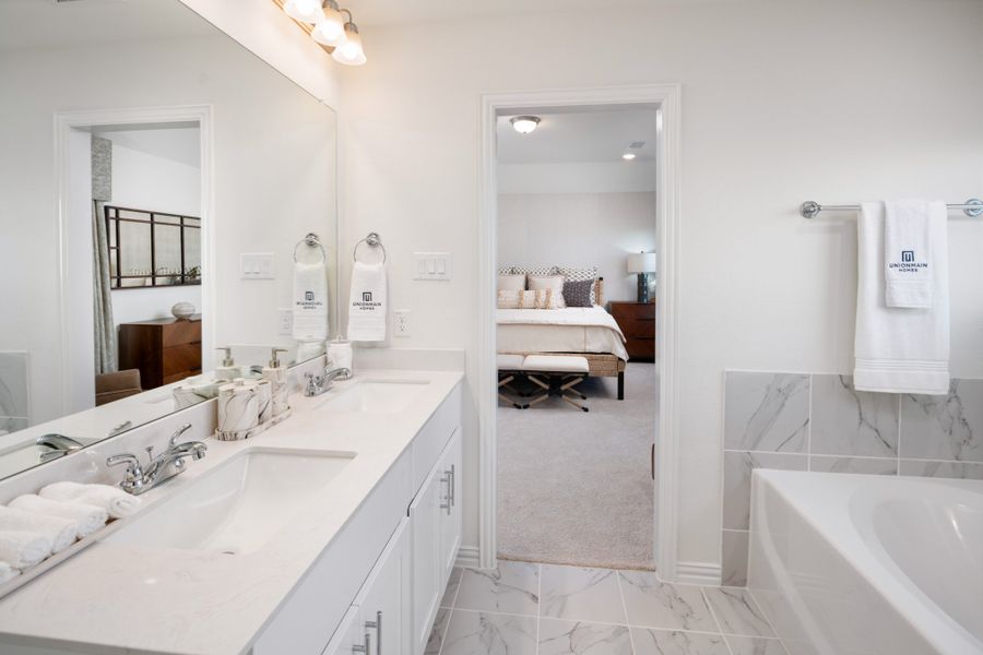 Representative furnished interior of a home built from the Kingston by UnionMain Homes in Elevon, Lavon (Image 48).