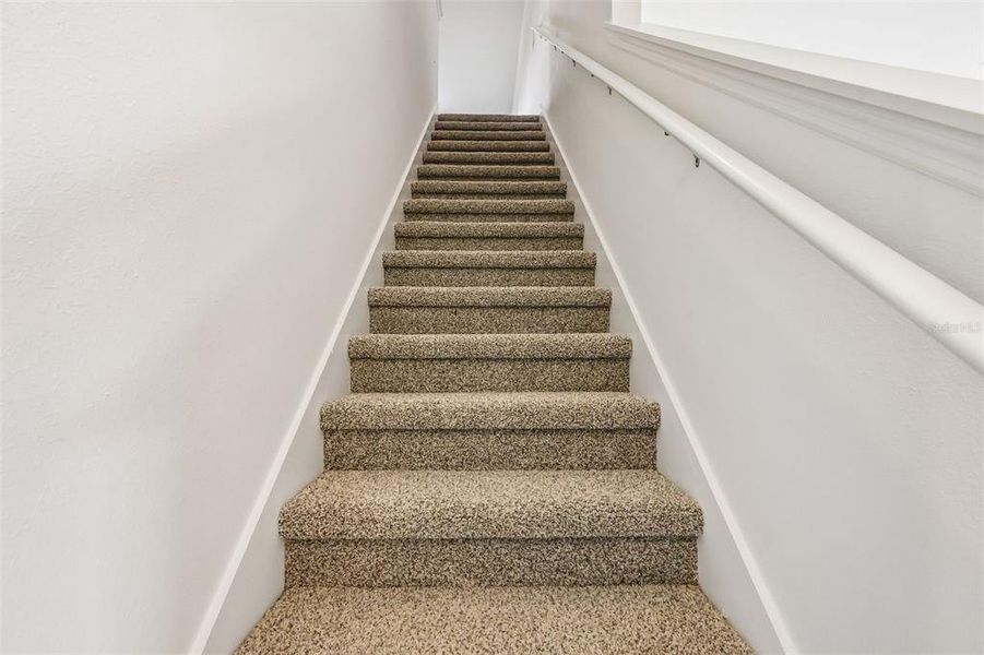 Spacious, unfurnished interior of a new home in The Grove at Stuart Crossing - Signature Series, Bartow (Image 31).