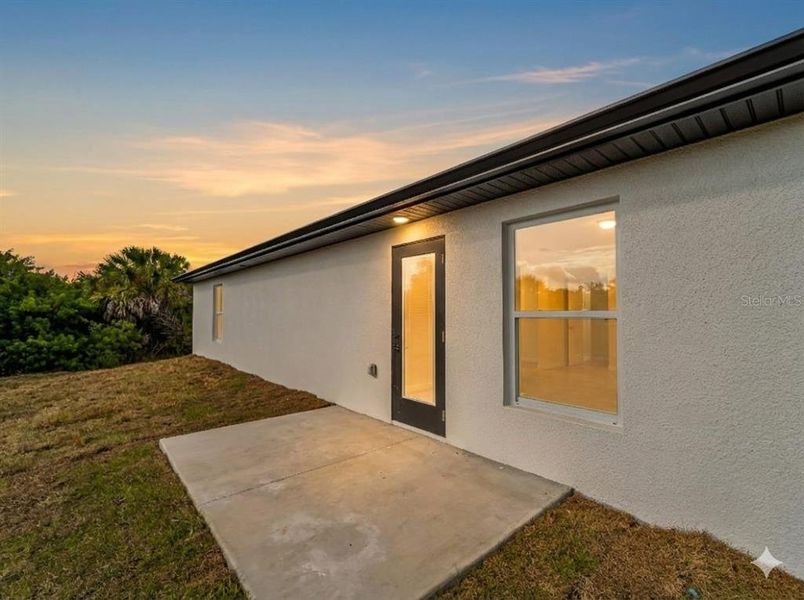 Exterior details and patio area of a home in , Port Charlotte (Image 3).