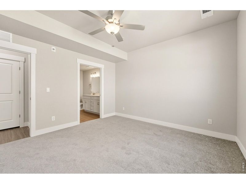 Spacious, unfurnished interior of a new home in The Lakes at Centerra - North Shore Flats, Loveland (Image 10).