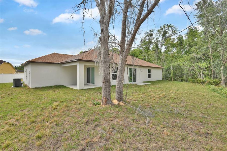Front exterior of a new home in , Kissimmee, FL, highlighting curb appeal (Image 14).