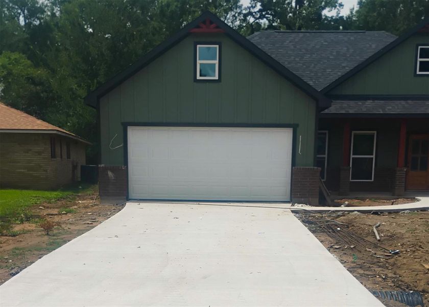 Front exterior of a new home in , Livingston, TX, highlighting curb appeal (Image 1). Front exterior of a new home in , Livingston, TX, highlighting curb appeal (Image 1).