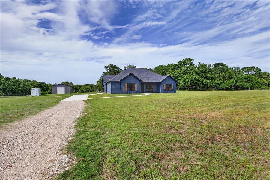 Front exterior of a new home in , Athens, TX, highlighting curb appeal (Image 18).