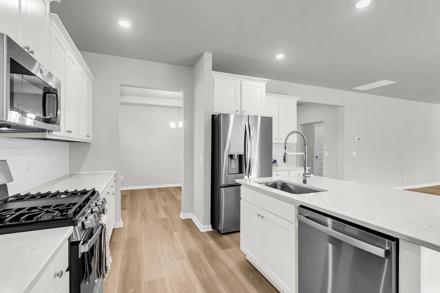 Furnished interior view inside a new home in Limehouse Village: Arbor Series, Summerville (Image 11).