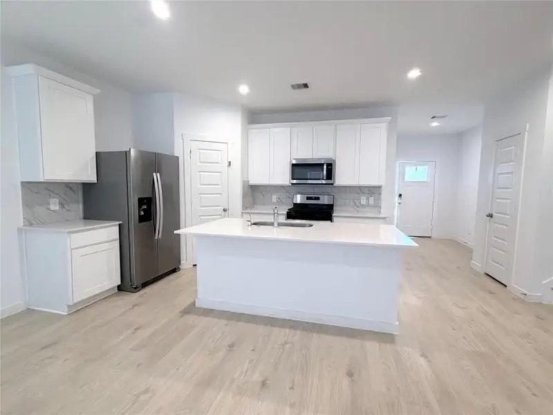 Furnished interior view inside a new home in , Fulshear (Image 9).