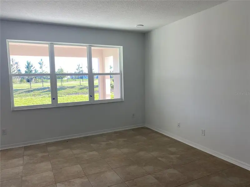 Spacious, unfurnished interior of a new home in K-Bar Ranch Gilded Woods, Tampa (Image 7).