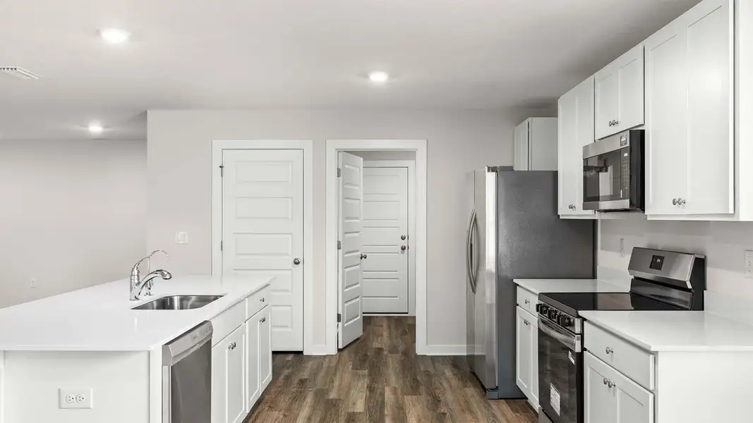 Furnished interior view inside a new home in Sunny Hills, Chipley (Image 4).