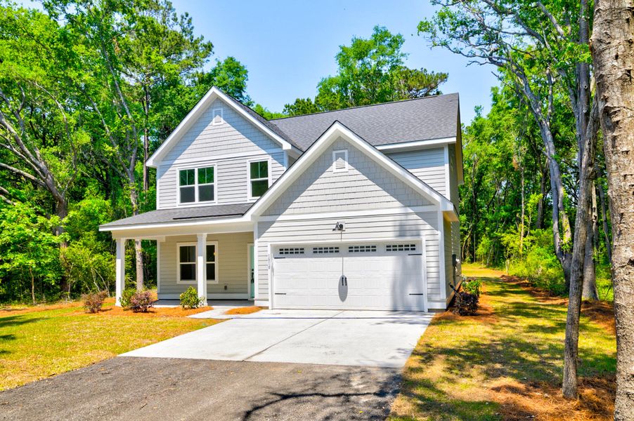 Front exterior of a new home in , Charleston, SC, highlighting curb appeal (Image 2).