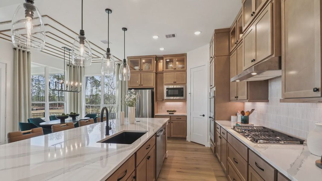 Representative furnished interior of a home built from the Marbella by Chesmar Homes in Audubon, Magnolia (Image 9).
