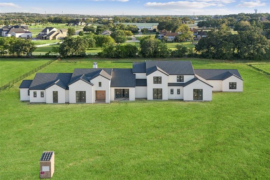 Front exterior of a new home in , Bartonville, TX, highlighting curb appeal (Image 1). Front exterior of a new home in , Bartonville, TX, highlighting curb appeal (Image 1).