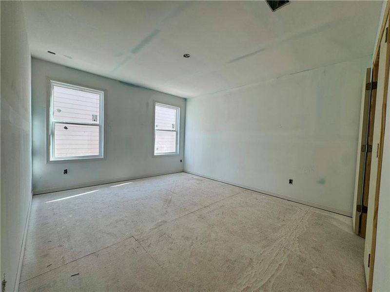 In-progress construction of a new home in Eastlyn Crossing - Single Family, Flowery Branch, GA (Image 18).