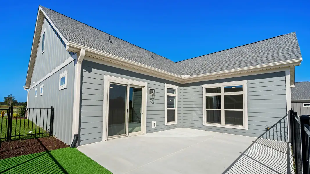 Exterior details and patio area of a home in Courtyards by Carrell, Ocean Isle Beach (Image 3). Exterior details and patio area of a home in Courtyards by Carrell, Ocean Isle Beach (Image 3).