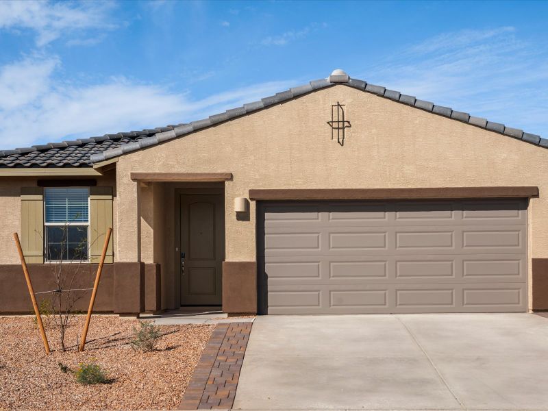 Front exterior of a new home in Alamar at Rocking K, Tucson, AZ, highlighting curb appeal (Image 1). Front exterior of a new home in Alamar at Rocking K, Tucson, AZ, highlighting curb appeal (Image 1).