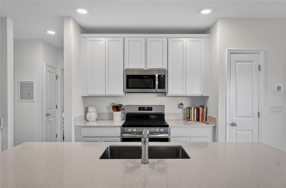 Furnished interior view inside a new home in Preserve at LPGA: Manor Collection, Daytona Beach (Image 5).