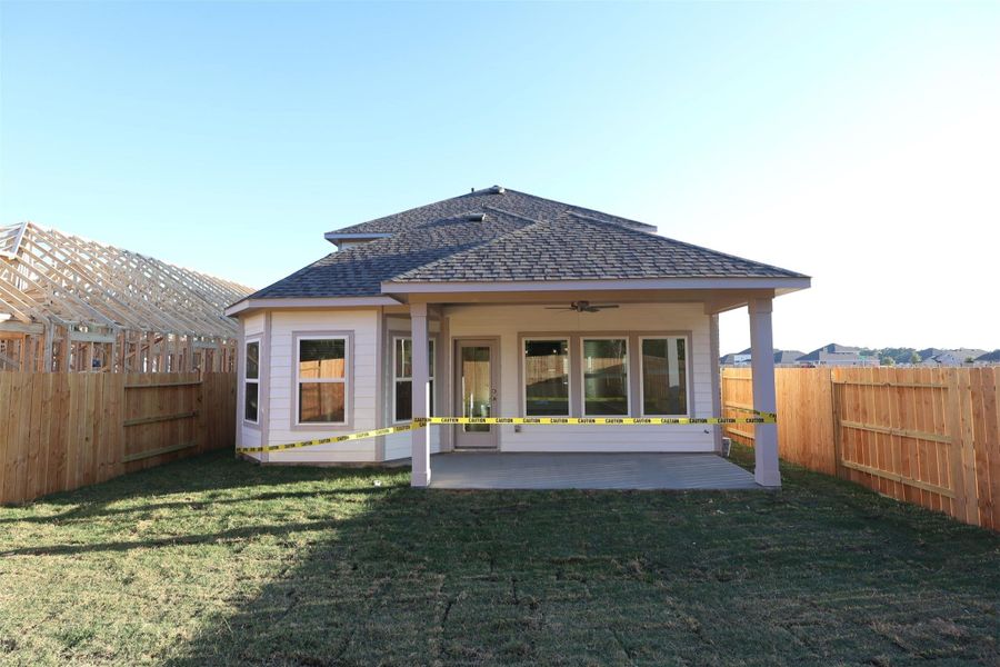 Exterior details and patio area of a home in Sorella, Tomball (Image 12).