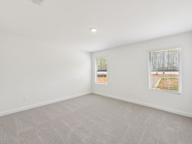 Spacious, unfurnished interior of a new home in Rocky River Towns, Charlotte (Image 12).