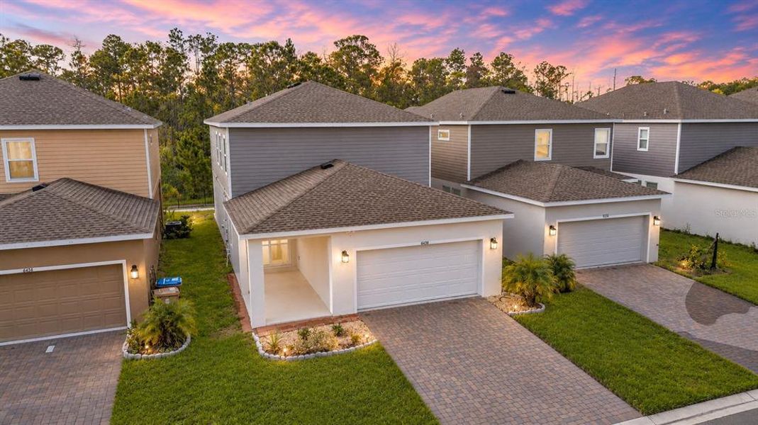 Front exterior of a new home in , St. Cloud, FL, highlighting curb appeal (Image 1). Front exterior of a new home in , St. Cloud, FL, highlighting curb appeal (Image 1).