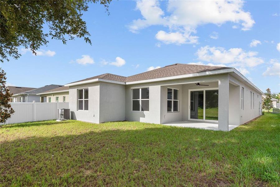 Exterior details and patio area of a home in , Groveland (Image 4).