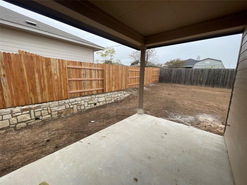 Exterior details and patio area of a home in Covered Bridge, Hutto (Image 4).