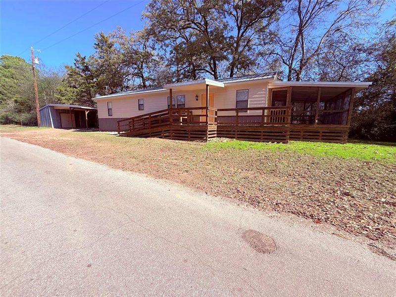 Front exterior of a new home in , Winnsboro, TX, highlighting curb appeal (Image 2). Front exterior of a new home in , Winnsboro, TX, highlighting curb appeal (Image 2).