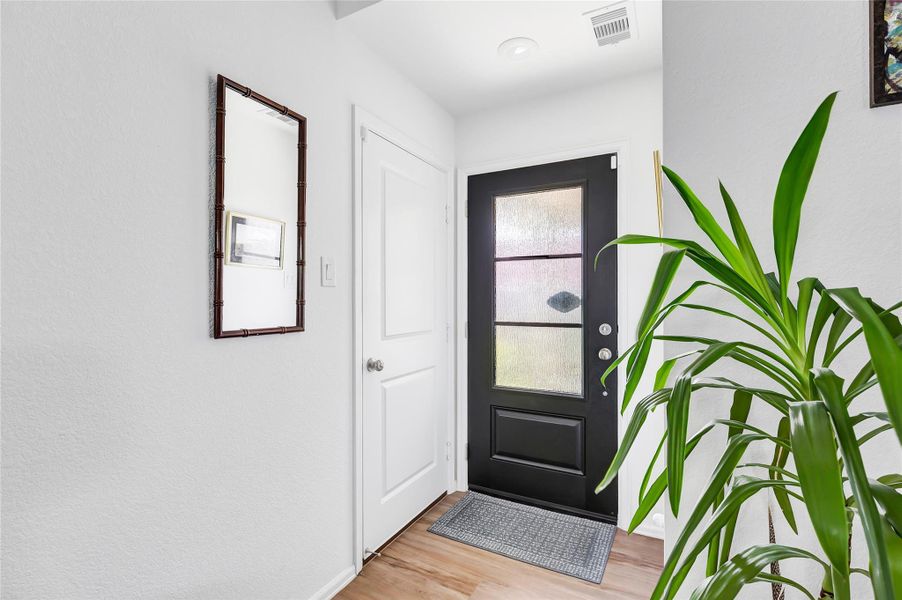 Beautiful front door allows natural light into the home!