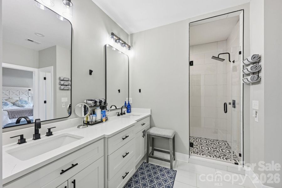 Primary Bath with Beautifully Tiled Shower