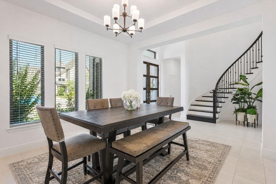 Formal dining area feeds into the bar/butlers pantry and then into the kitchen