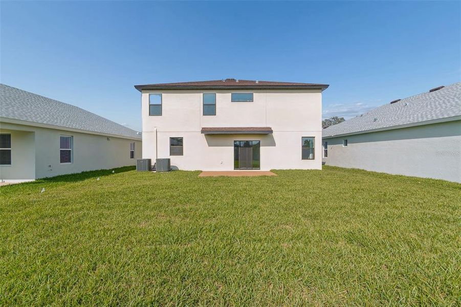Exterior details and patio area of a home in Avalon West, Spring Hill (Image 38).