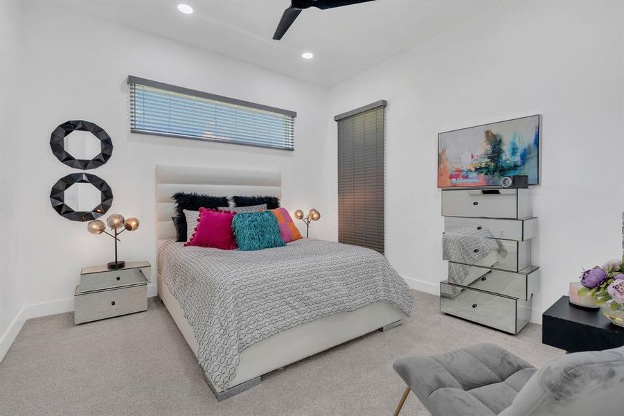 Bedroom with carpet, a ceiling fan, and recessed lighting