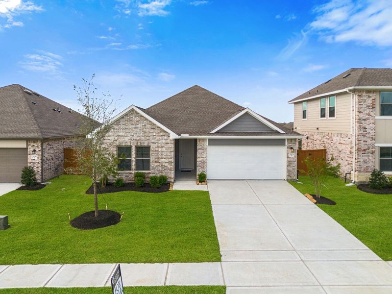 Front exterior of a new home in River Ranch Trails, Dayton, TX, highlighting curb appeal (Image 18). Front exterior of a new home in River Ranch Trails, Dayton, TX, highlighting curb appeal (Image 18).