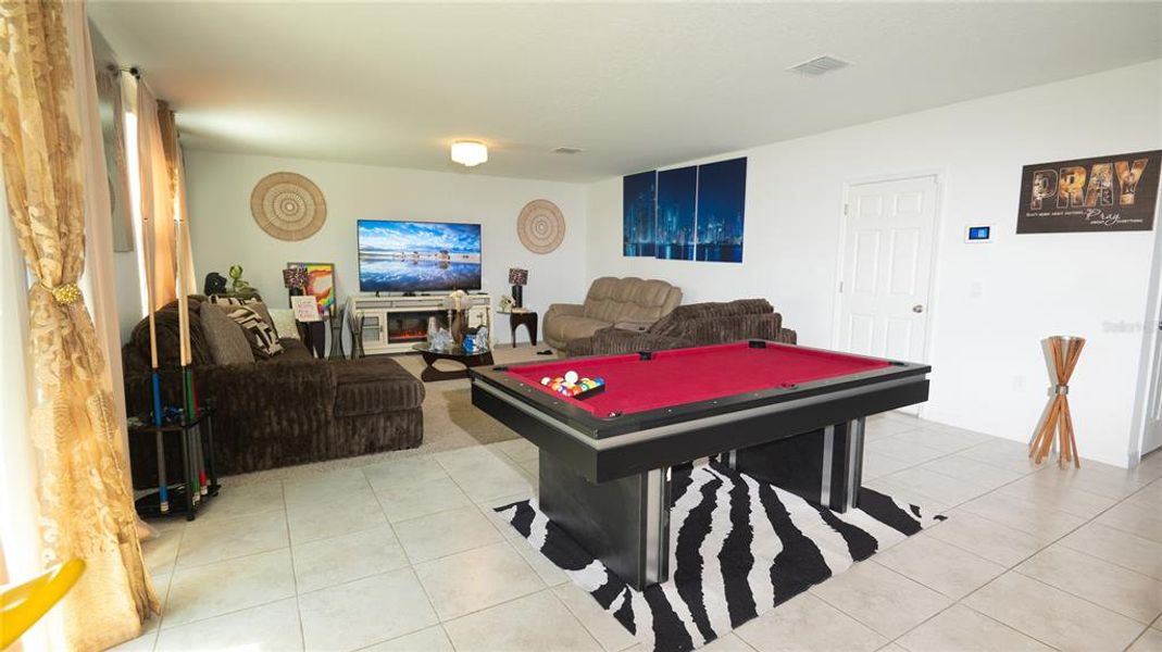 Furnished interior view inside a new home in Lake Deer Estates - Signature Series, Poinciana (Image 8). Furnished interior view inside a new home in Lake Deer Estates - Signature Series, Poinciana (Image 8).