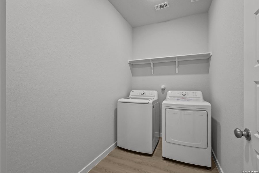 Furnished interior view inside a new home in Cinco Lakes, San Antonio (Image 8).