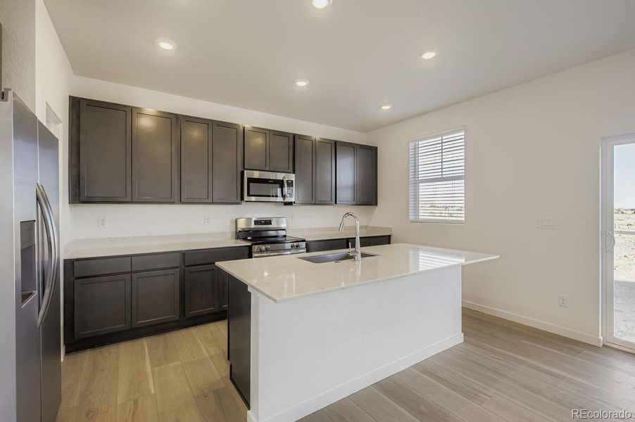 Furnished interior view inside a new home in Riano Ridge, Loveland (Image 4). Furnished interior view inside a new home in Riano Ridge, Loveland (Image 4).