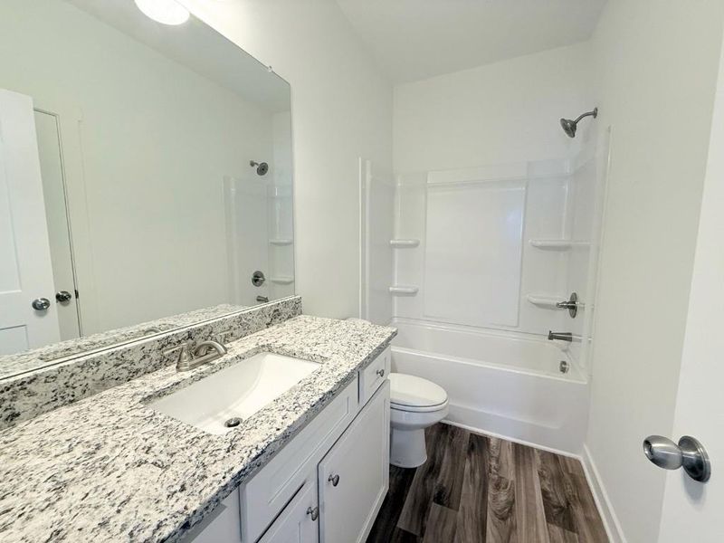 Furnished interior view inside a new home in Sutton's Landing, Statham (Image 14).