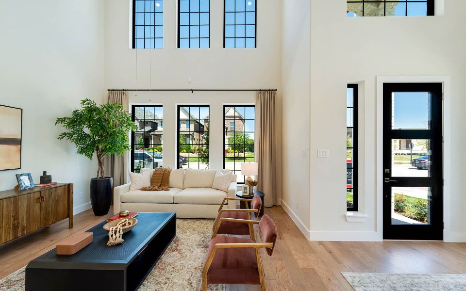 Representative furnished interior of a home built from the Rainier by CastleRock Communities in The Summit at Center Stage, Keller (Image 6).