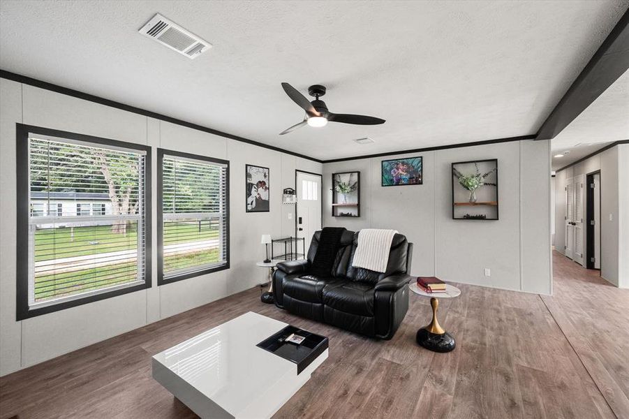 Open living room with ceiling fan Open living room with ceiling fan