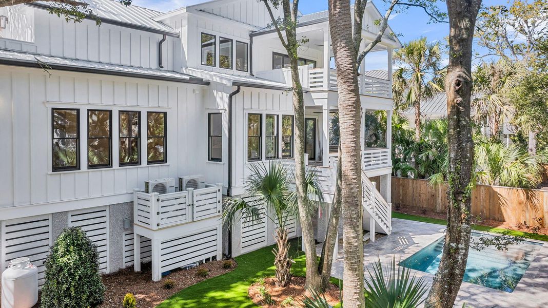 Exterior details and patio area of a home in , Isle Of Palms (Image 36).