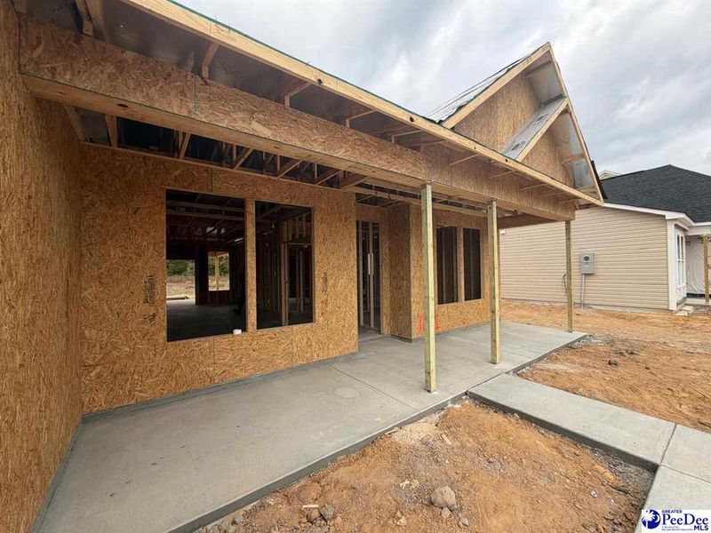 In-progress construction of a new home in The Grove, Florence, SC (Image 5).