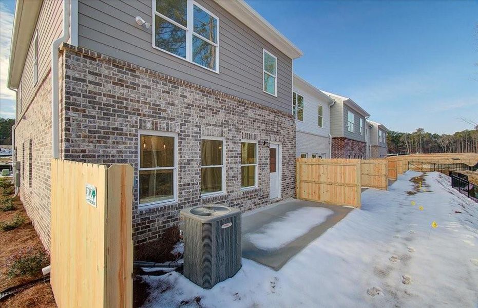 Exterior details and patio area of a home in Wildwood Place, Powder Springs (Image 22).